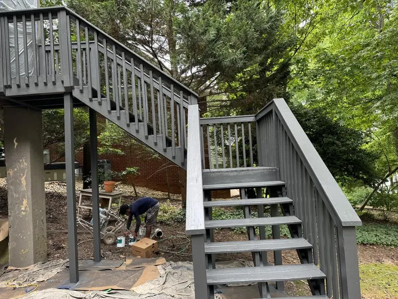 Deck & stairs — sprayed rails, treads, and posts — exterior painting by Vibrant Painting, Greenville SC