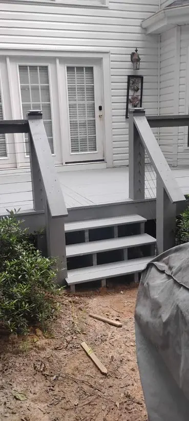 Deck steps — treads, risers, and rail — exterior painting by Vibrant Painting, Greenville SC