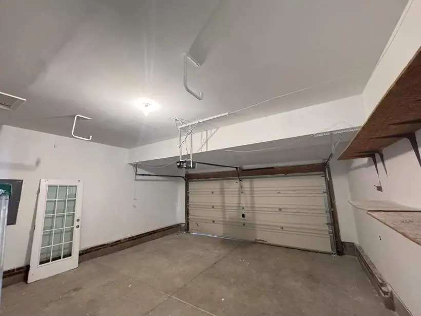 Garage — walls and ceiling coated — whole-home repaint by Vibrant Painting, Greenville SC