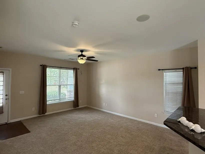 Living room — walls, ceiling, and trim — make-ready turnover by Vibrant Painting, Greenville SC