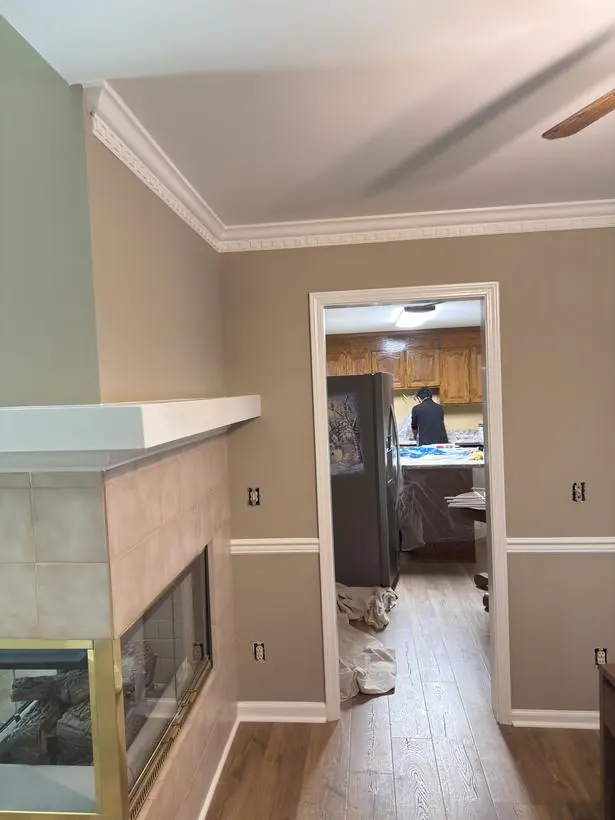 Fireplace & kitchen — dentil crown and passage casing — interior repaint by Vibrant Painting, Greenville SC